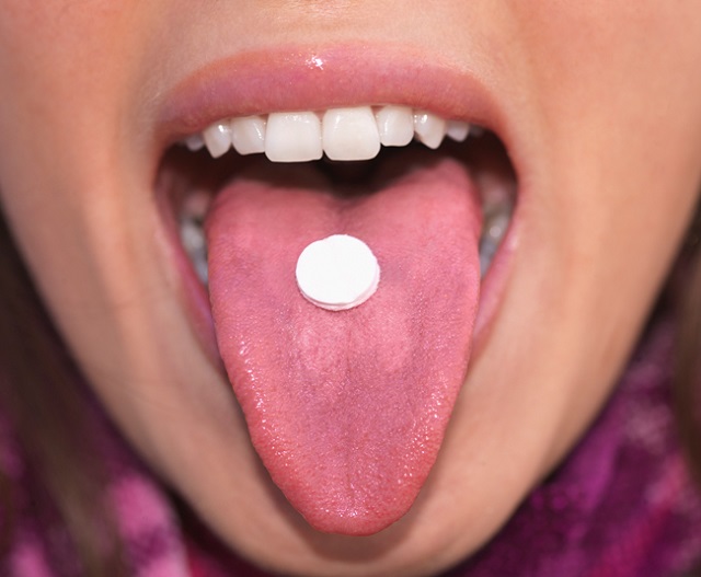 Таблетка на языке