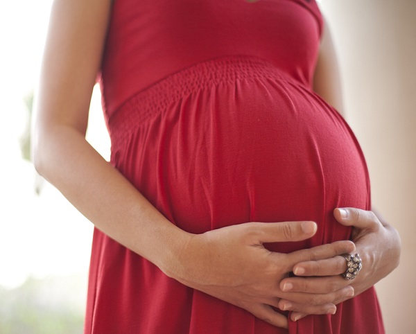 Беременная