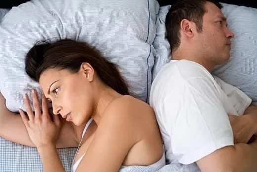 Мужчина и женщина в постели