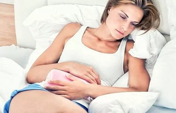 Болит низ живота у девушки